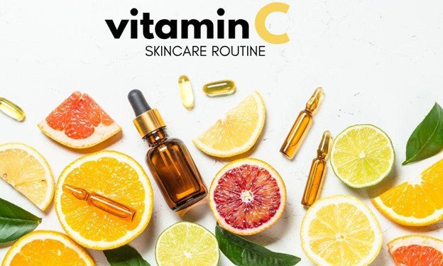 Vitamin C skincare routine banner with an amber serum bottle, ampoules and sliced citrus fruit