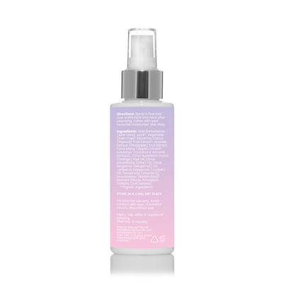 A spray bottle of Revitalising Toning Mist with a purple to pink gradient color design, labeled with product information.