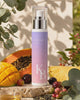 Kaloneo Beauty Hydrating Cream on travertine stone surrounded by fresh mango, papaya, pineapple and native Australian botanicals in soft morning daylight - portrait product film with music