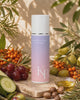 Kaloneo Beauty Rejuvenating Eye Cream on travertine stone surrounded by sea buckthorn berries, olive and lemon myrtle branches, cucumber and red grapes in warm daylight - portrait product film with music